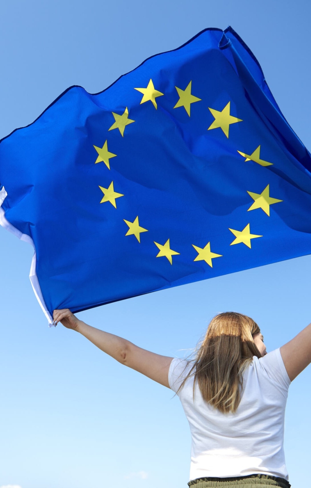 Girl holding EU flag