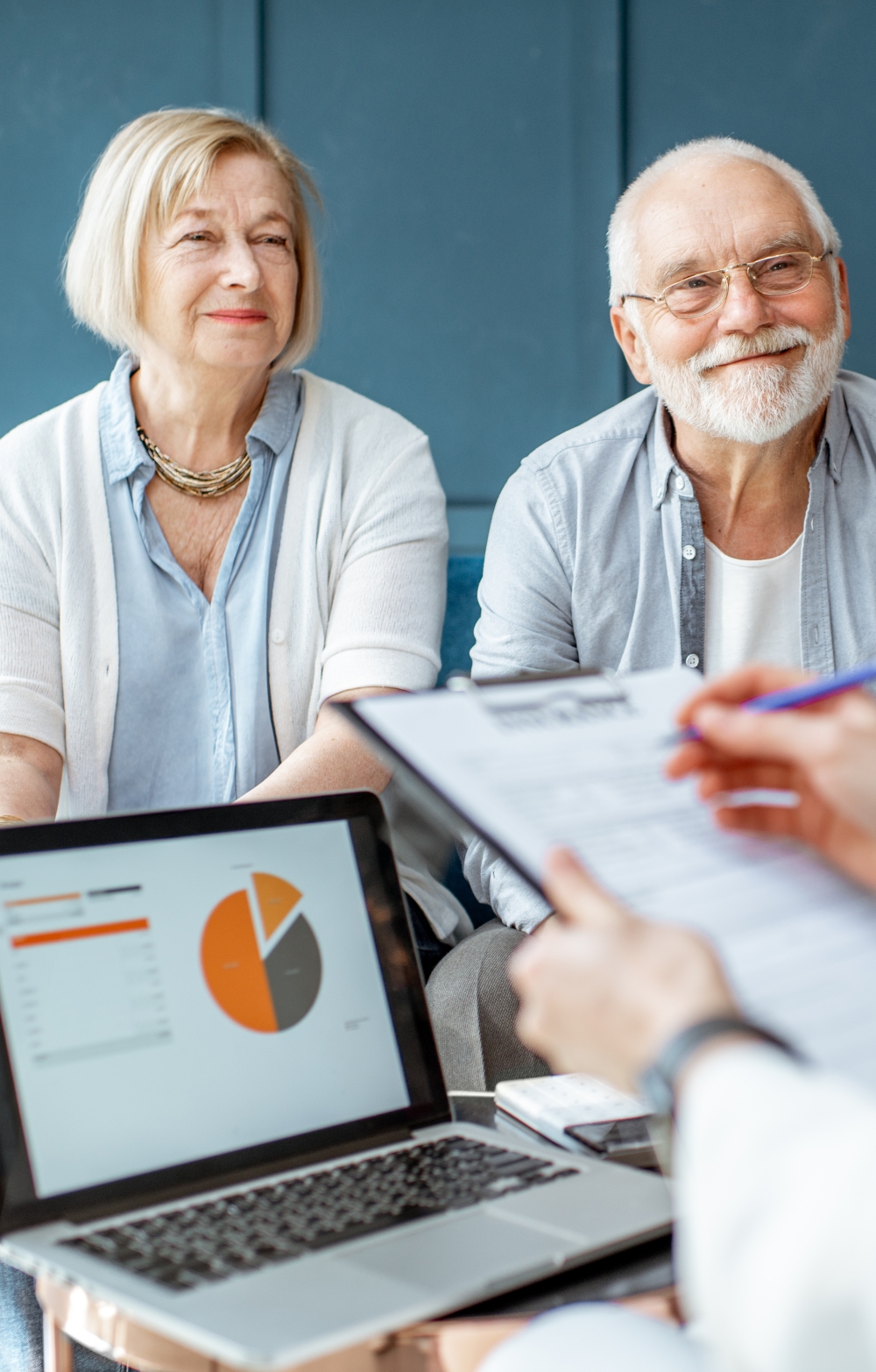 Smiling pensioners receiving advice