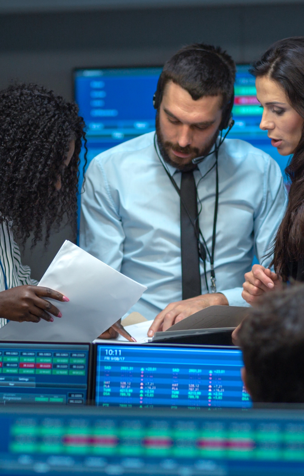 people talking on the stock exchange floor