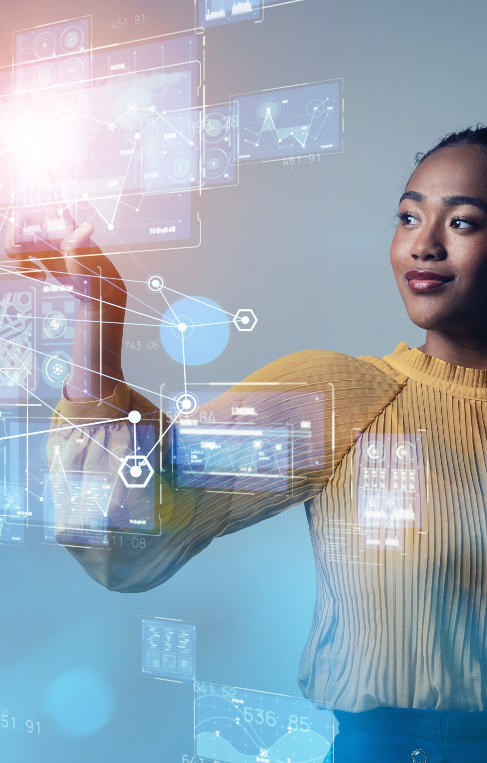 Lady pointing at digital virtual symbols